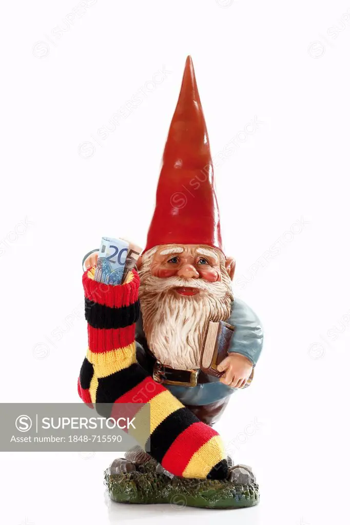 Garden gnome with a red pointy hat holding a piggy bank in Germany's national colours