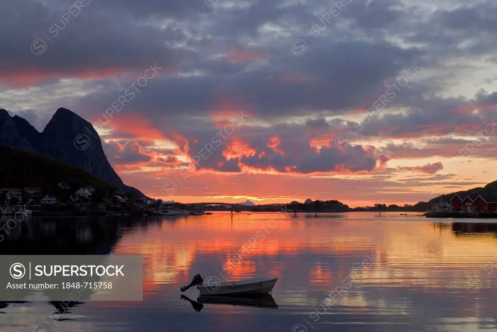 Sunrise with a small boat near Reine, island of Moskenesøy, Moskenesoy, Lofoten archipelago, Nordland, Norway, Europe