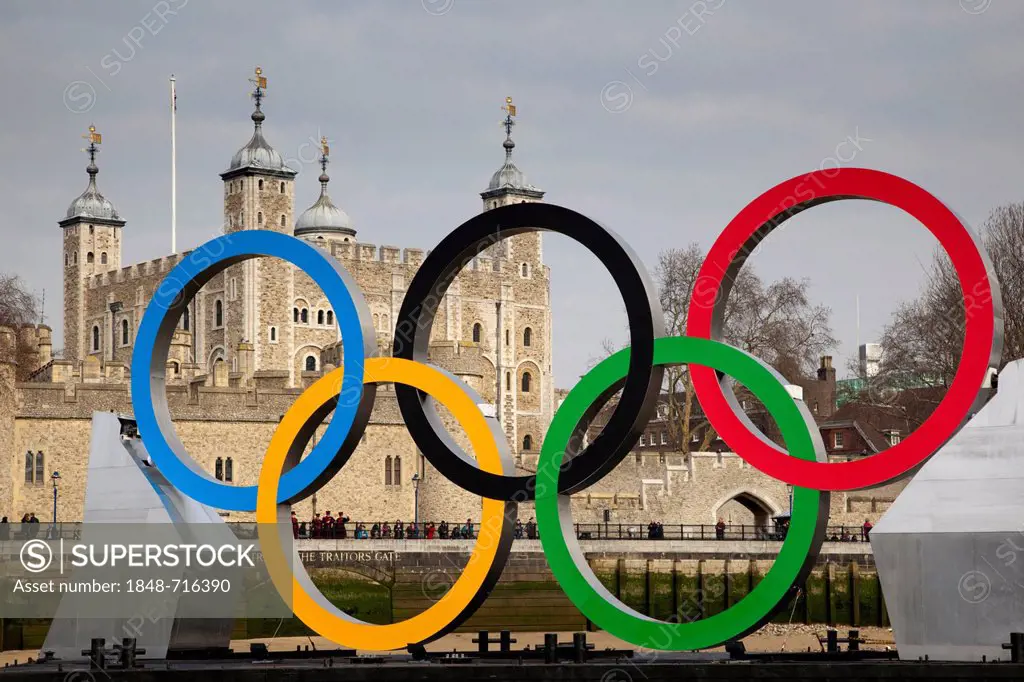 Giant Olympic Rings are floated down the River Thames in front of the Tower of London to promote the Olympic Games in London 2012, London, England, Un...