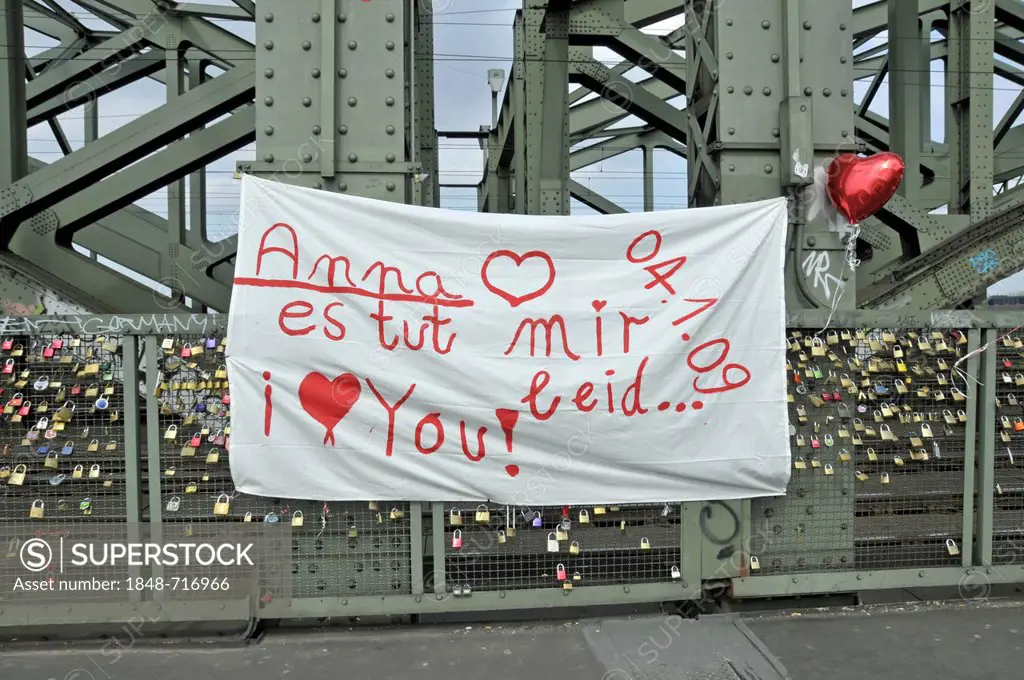 Apology transparent, Hohenzollernbruecke bridge, Cologne, North Rhine-Westphalia, Germany, Europe, PublicGround