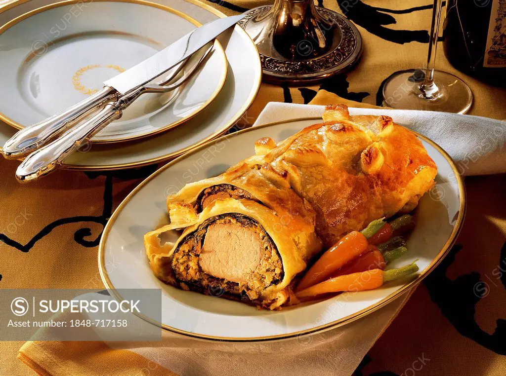 Vienna-style pork fillet with a spicy mushroom farce and a crispy puff pastry wrap, Austria