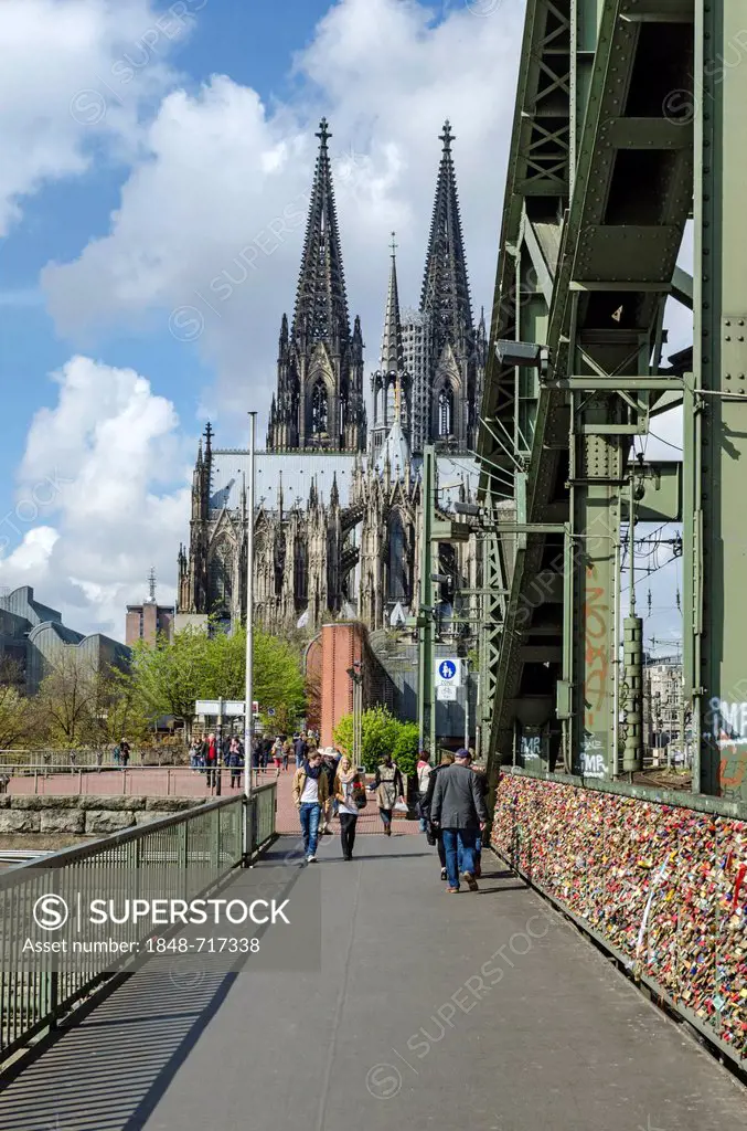 Pedestrian walkway on Hohenzollern Bridge, looking towards Cologne Cathedral, Cologne, North Rhine-Westphalia, Germany, Europe
