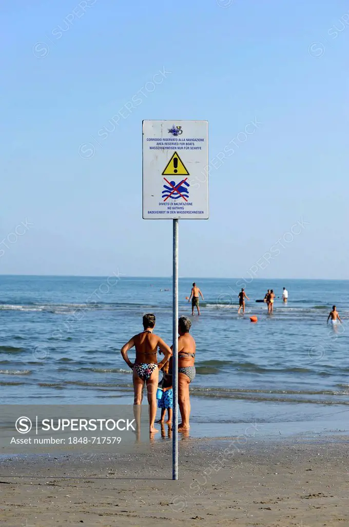 Sign swimming prohibited and bathers on the beach of the northern Adriatic Sea, Cavallino, Jesolo, Venice, Europe