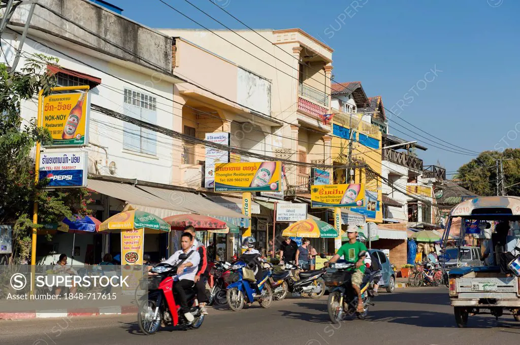 Traffic, shops and restaurants, Fa Ngum Road, Vientiane, Laos, Indochina, Asia