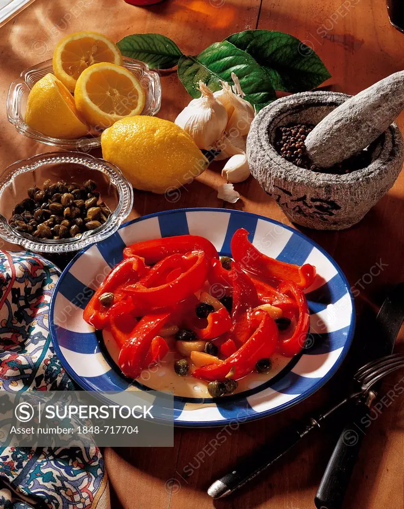 Roasted peppers, braised in white wine with garlic, capers and vegetables, Algeria