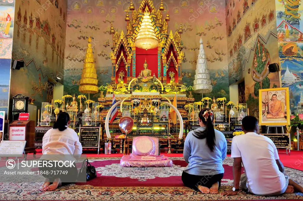 Altar with a golden Buddha statue from the Lan Xang era, Wat Pho Chai, Nong Khai, Thailand, Asia, PublicGround