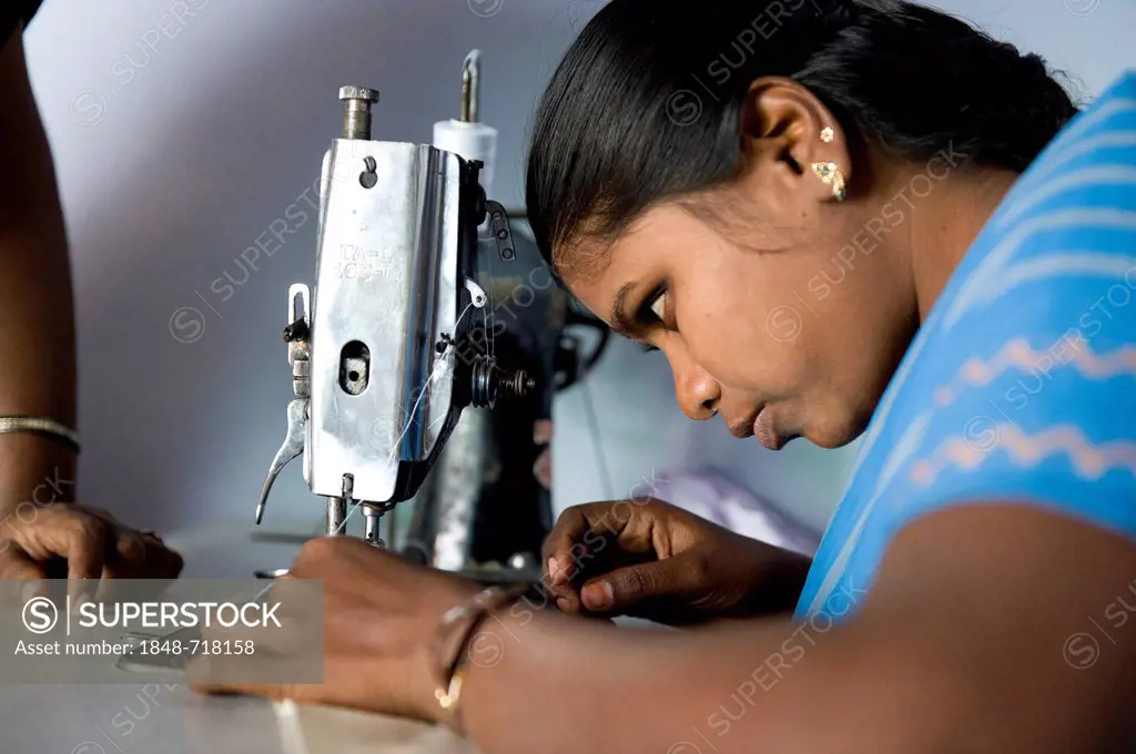 Young woman is taught sewing and dressmaking, vocational and technical training, Nanniyur Pudhur near Karur, Tamil Nadu, India, Asia