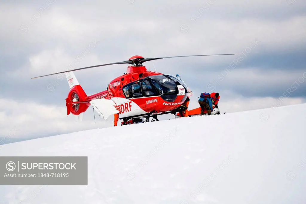 Rescue operation with a rescue helicopter in the Thuringian Slate Mountains, Thuringia, Germany, Europe