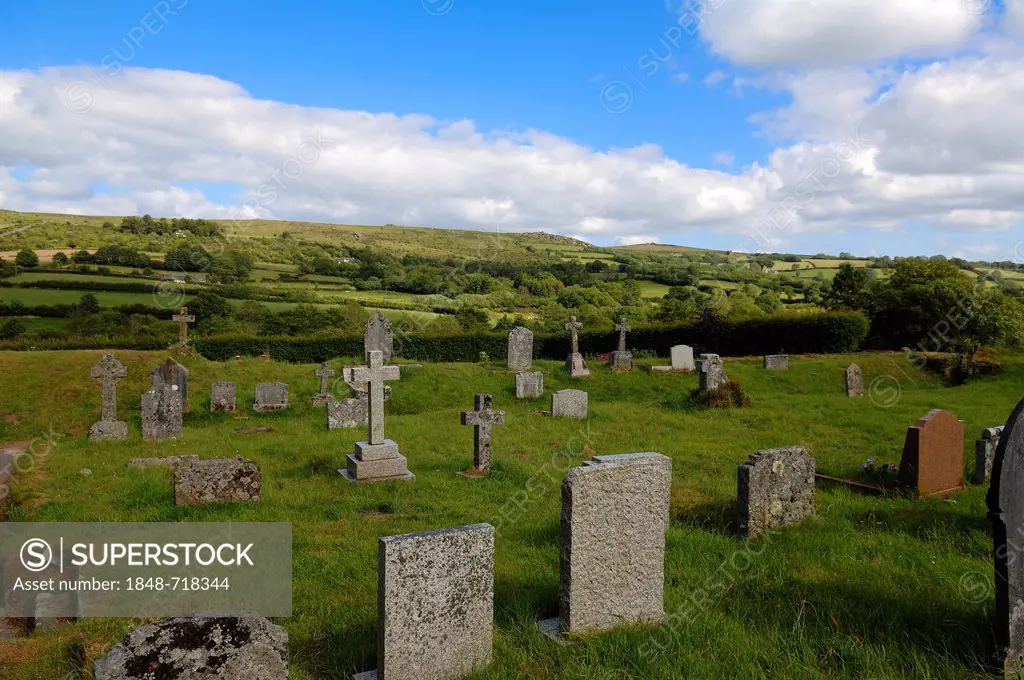Old cemetery of the church of St. Pancras overlooking the landscape of Dartmoor, Widecombe in the Moor, Dartmoor, Devon, England, United Kingdom, Euro...