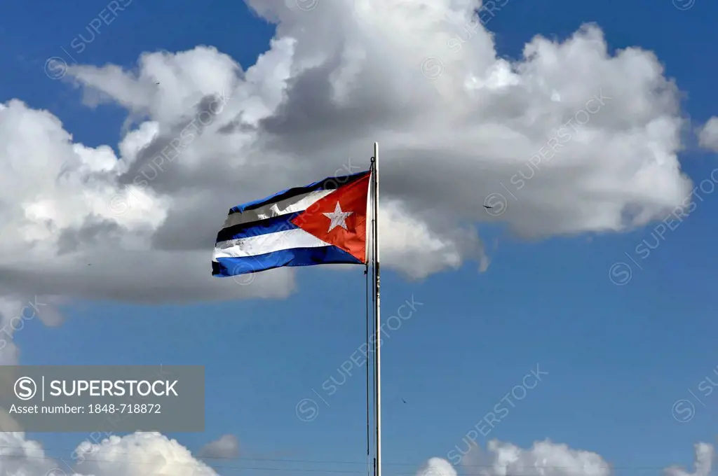 Cuban flag blowing in the wind, Cuba, Greater Antilles, Caribbean, Central America, America