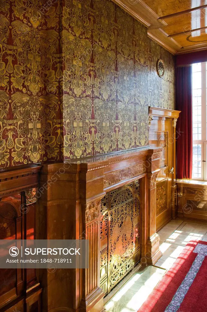 Ornately decorated wall with red-golden wallpaper made from the finest leather and a fireguard, by Heinrich Vogeler from Worpswede, created 1905, Guel...