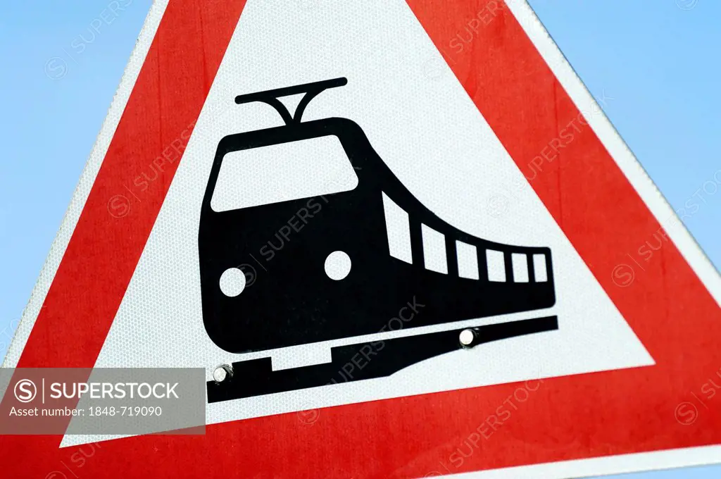 Road sign, level crossing without gate or barrier ahead, give priority to rail vehicles
