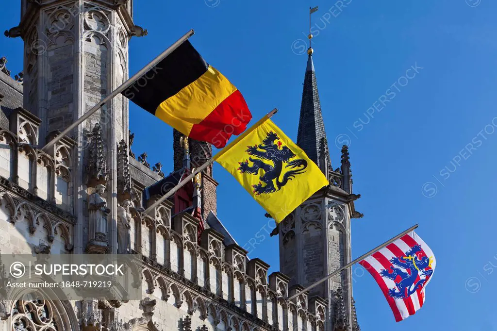 City hall with flags, Castle Square, old town of Bruges, UNESCO World Heritage Site, West Flanders, Flemish Region, Belgium, Europe