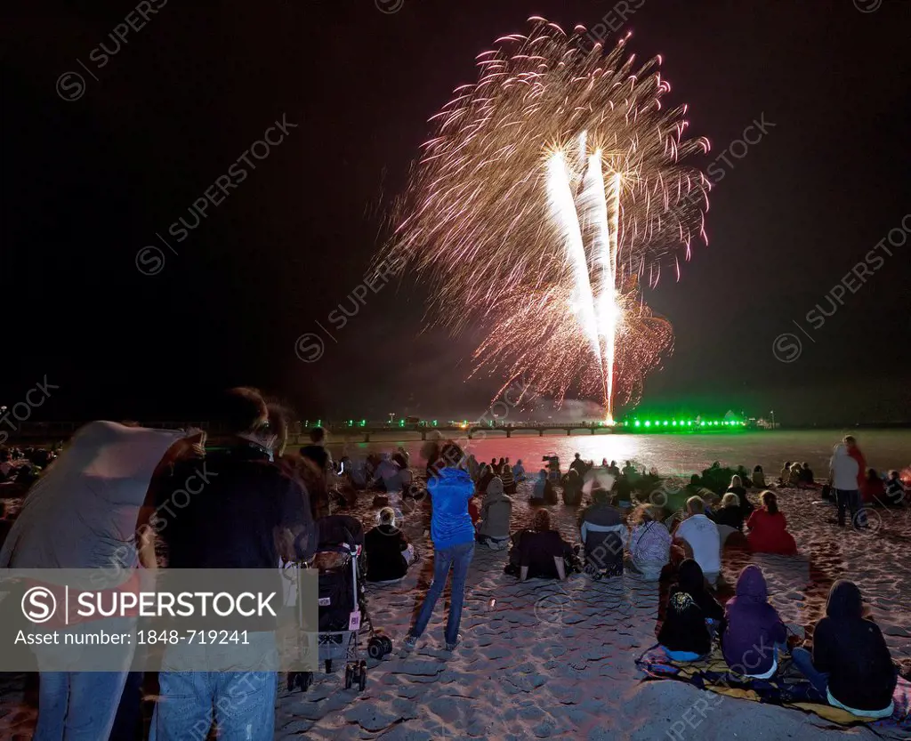 Baltic Sea in Flames, on Groemitz Pier, fireworks display at the end of the season, beach, spectators, at night, Baltic Sea resort town of Ostseebad G...