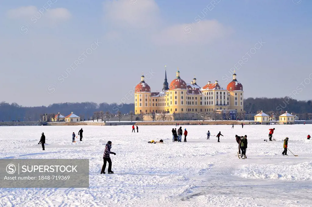 Ice skating at the frozen pond at Schloss Moritzburg Castle, winter, Moritzburg, Saxony, Germany, Europe, PublicGround