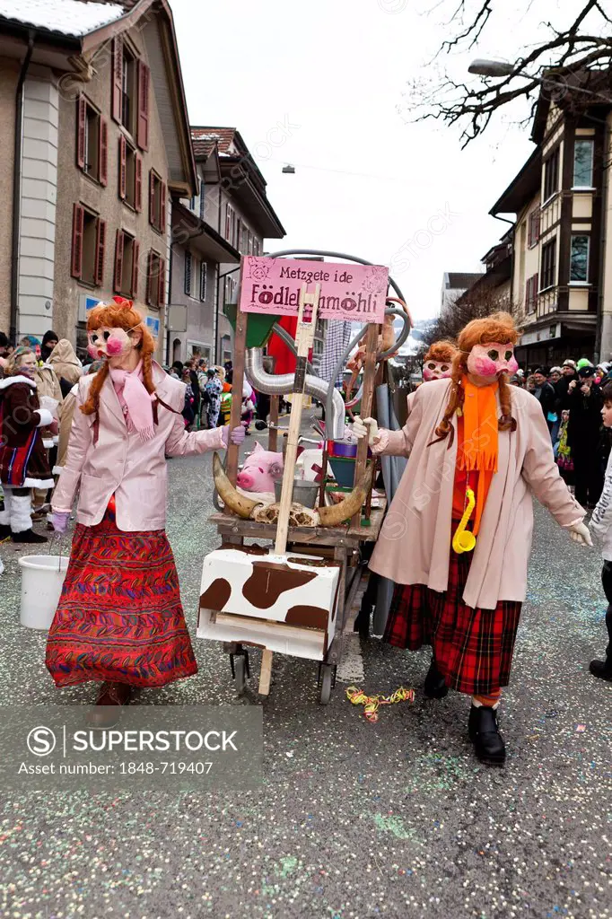 Pigs, costumes, freshly slaughtered pigs, 35th Motteri-Umzug parade in Malters, Lucerne, Switzerland, Europe