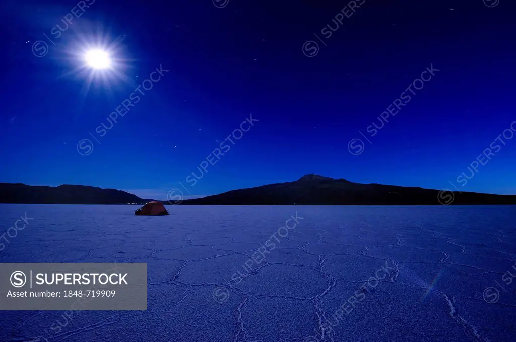 Salt lake with a tent in the moonlight, Salar de Uyuni, Uyuni, Bolivia, South America