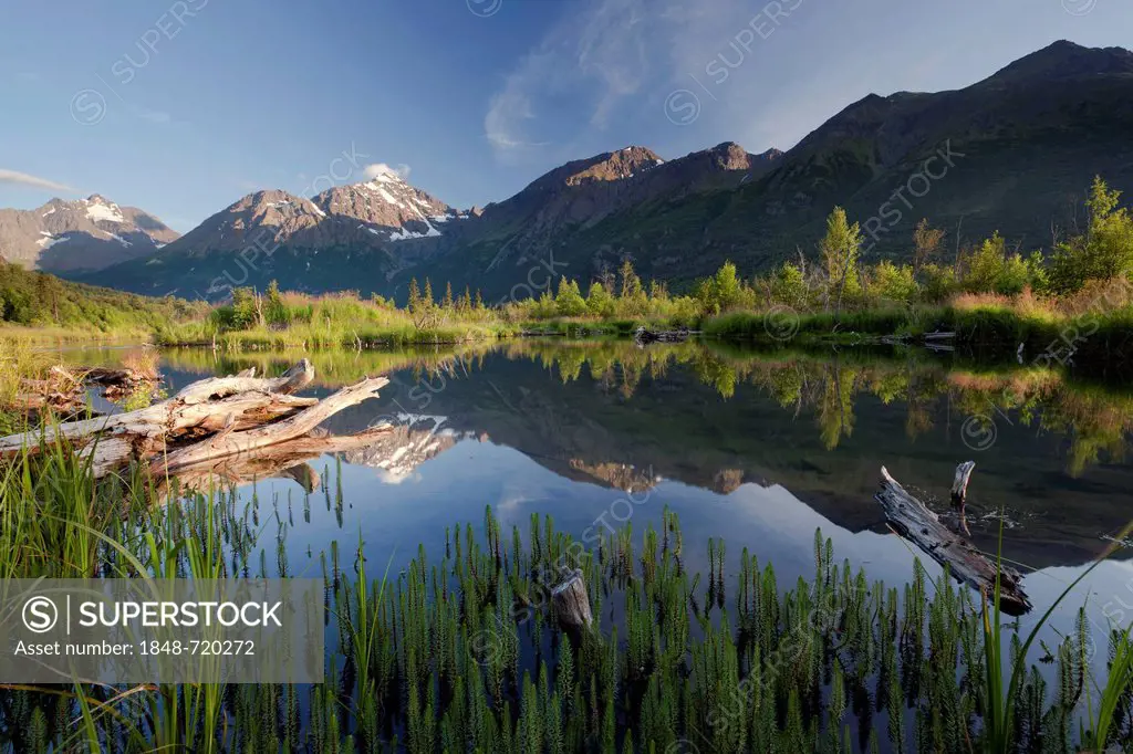 Eagle River with reflections of mountains, Alaska, USA