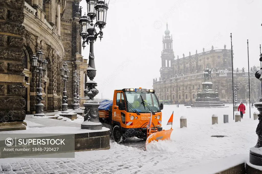 Winter service vehicle clearing snow in front of the Semperoper Opera House, Dresden, Saxony, Germany, Europe, PublicGround