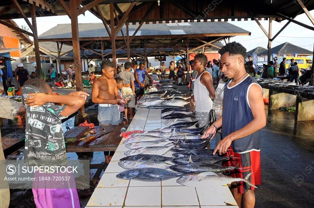 Papuan fishmongers at the fish market in Kota Biak, Biak Island, West Papua, Indonesia, Southeast Asia, Asia