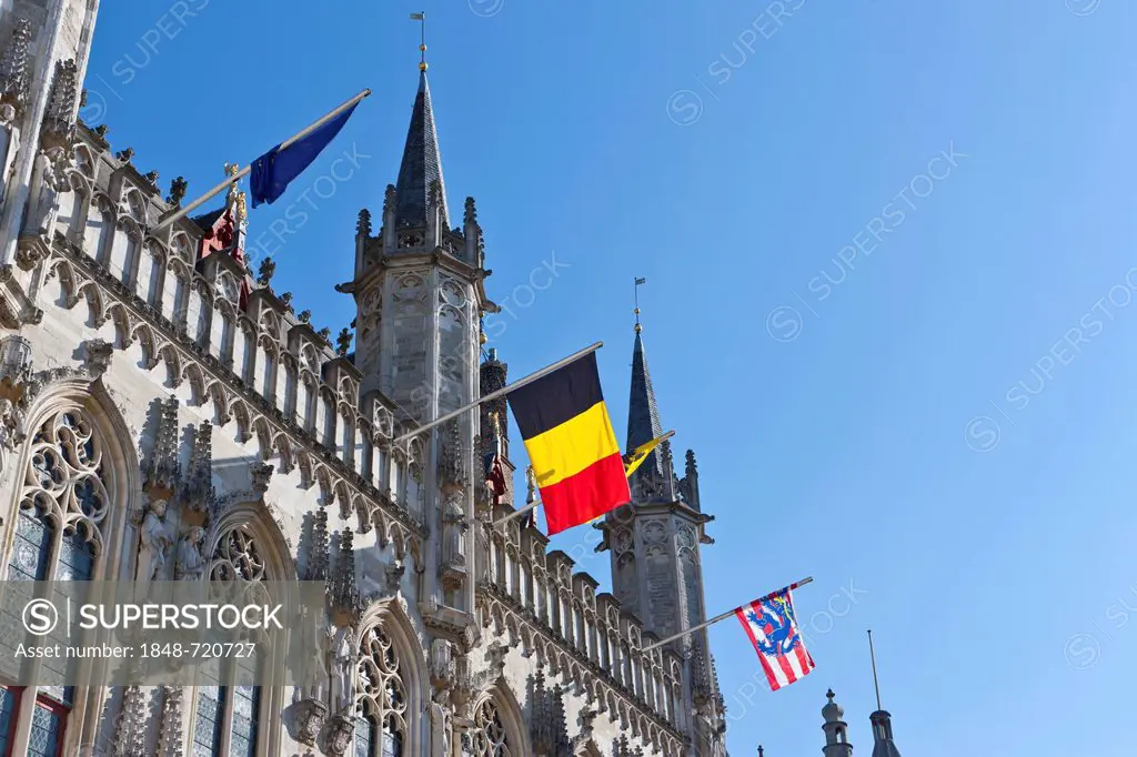 Stadhuis, city hall, with Belgian flag, Grote Markt square, old town of Bruges, UNESCO World Heritage Site, West Flanders, Flemish Region, Bruges, Bel...