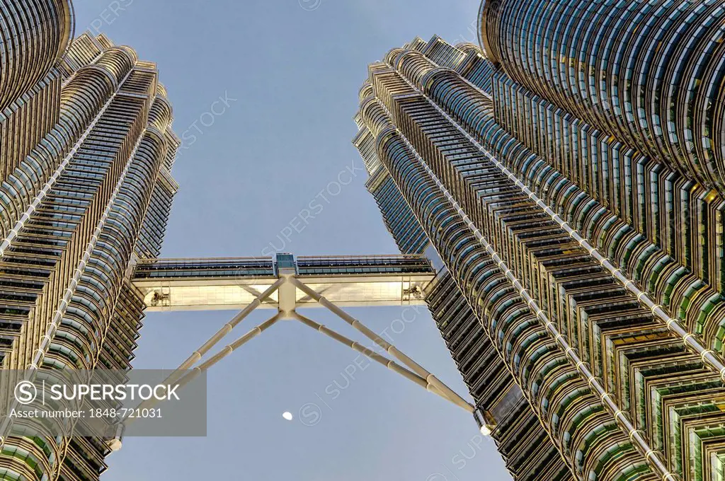 Petronas Towers at dusk with moon, skybridge, Kuala Lumpur, Malaysia, Southeast Asia