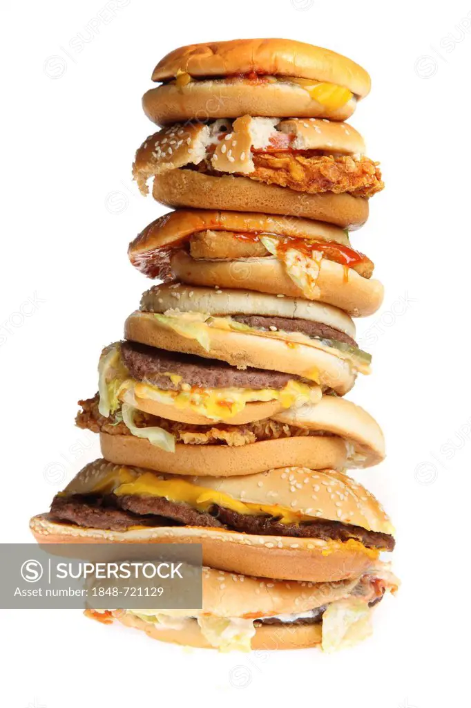 Fast food, stacked hamburgers, cheeseburgers, chickenburgers, vegetable burgers and fish burgers