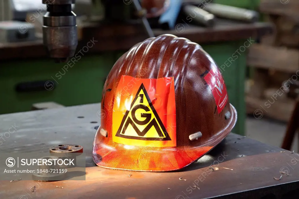 Helmet with a sticker of the IG Metall trade union, in the Luitpoldhuette AG in Amberg, Bavaria, Germany, Europe