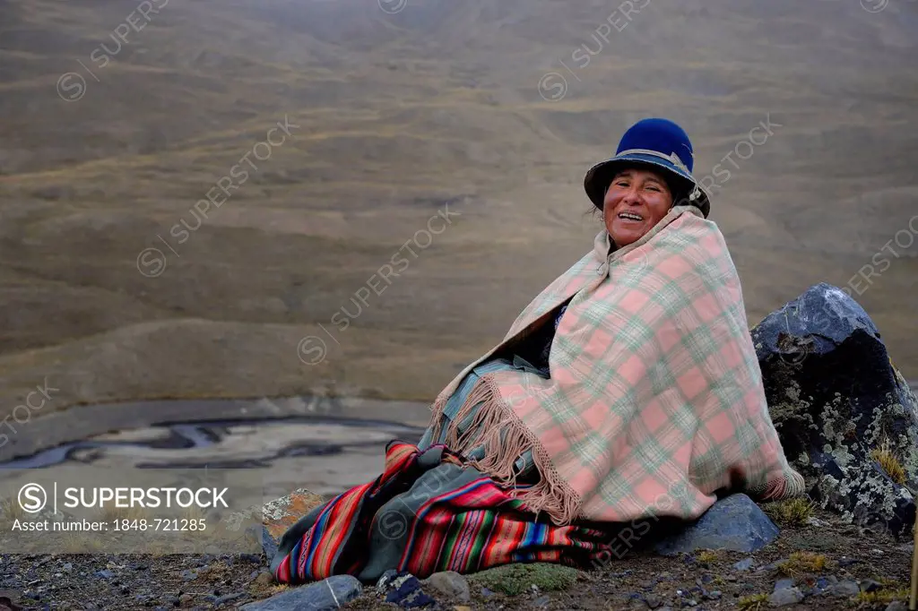 Indian woman in the mountain landscape, Tuni, La Paz, Bolivia, South America