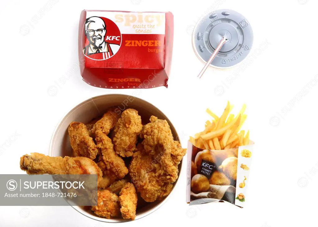 Fast food, various items from Kentucky Fried Chicken with a soft drink