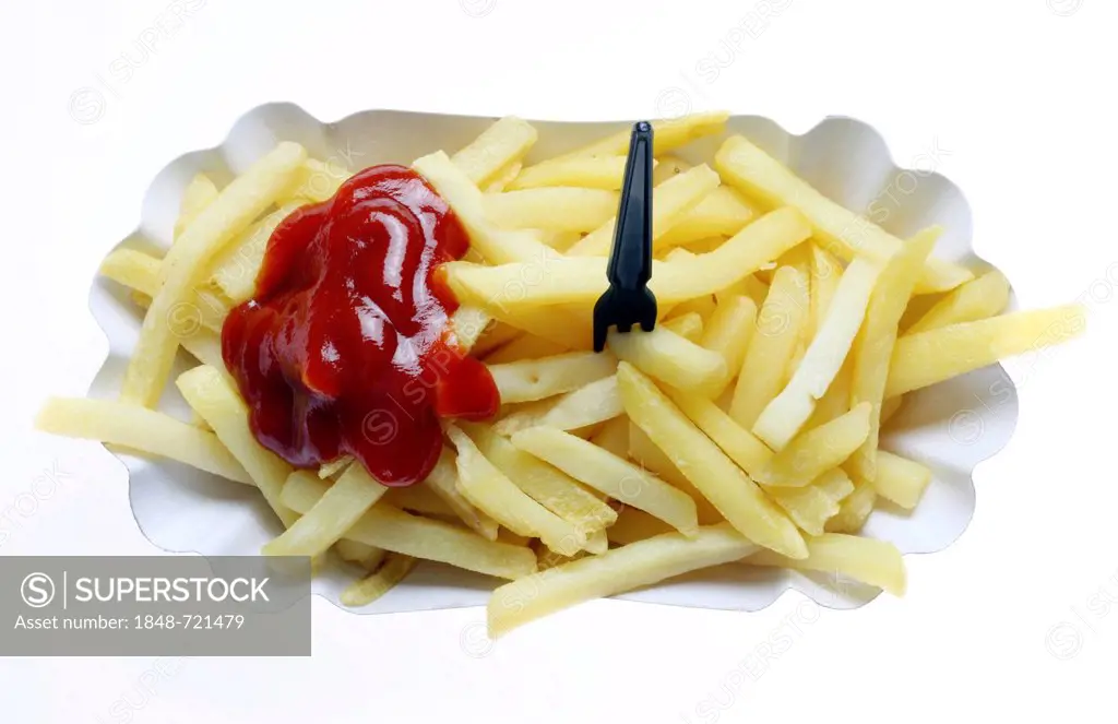 Fast food, French fries on a paper plate with ketchup
