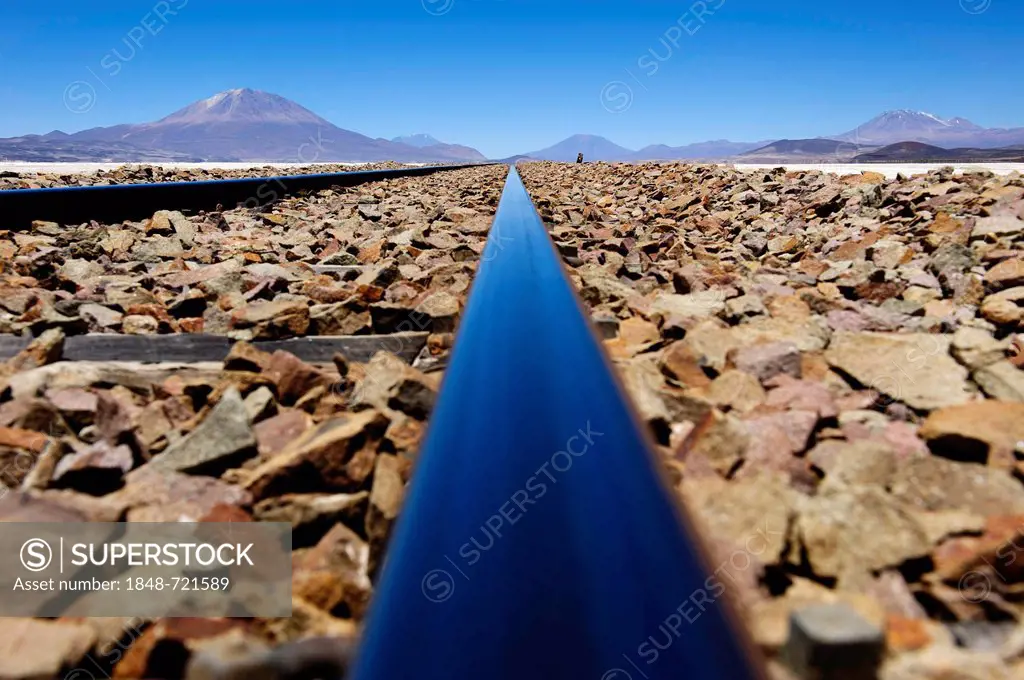 Railroad tracks with the Andes Mountains, Uyuni, Bolivia, South America