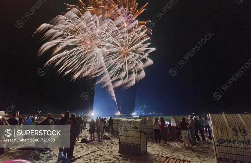 Baltic Sea in Flames, on Groemitz Pier, fireworks display at the end of the season, beach, spectators, roofed wicker beach chairs, at night, Baltic Se...