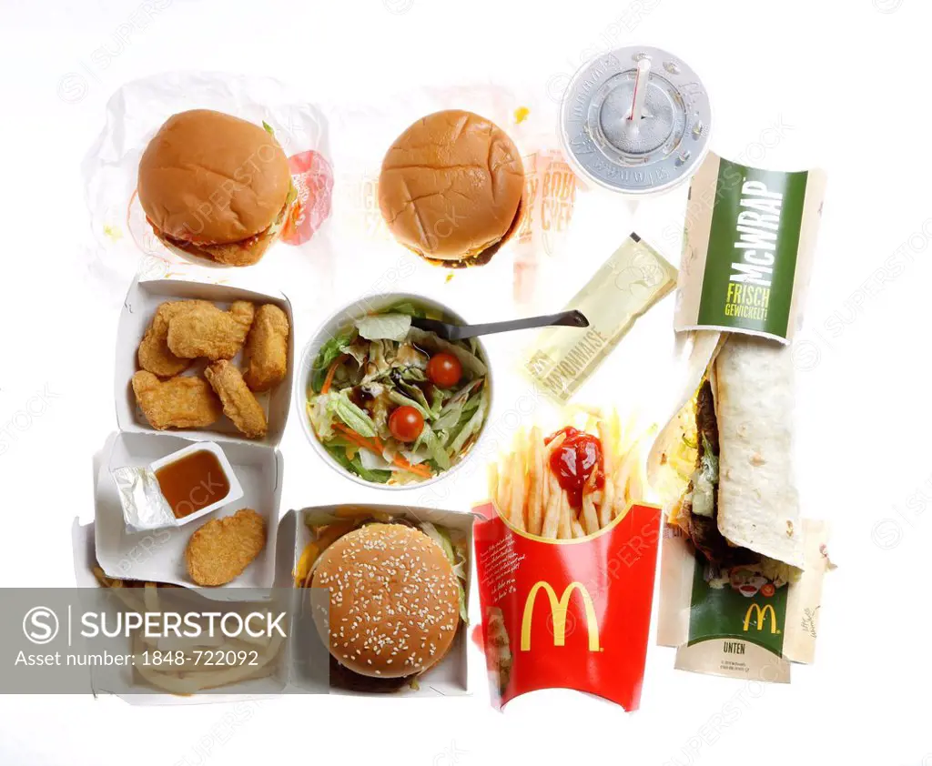 Fast food, various items from McDonalds, packed with a soft drink