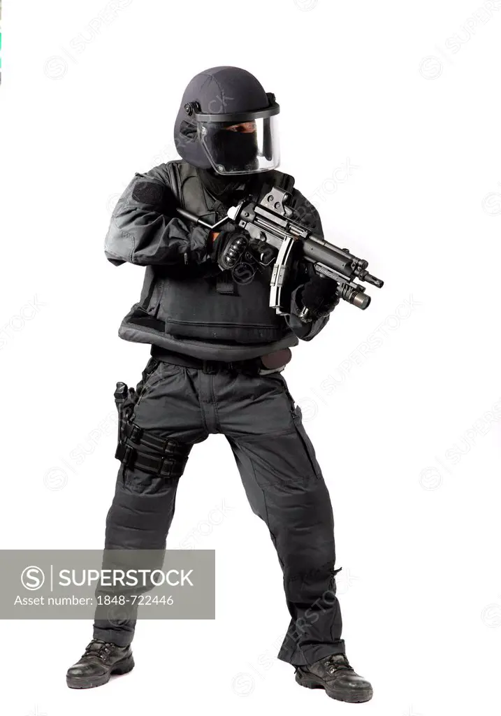 Police, Special Task Force, SEK, officer wearing full protective uniform holding a Heckler & Koch MP5 submachine gun