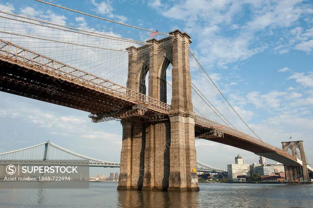 Suspension bridge over the East River, large bridge piers, Brooklyn Bridge, from Manhattan, New York City, New York, USA, North America, America