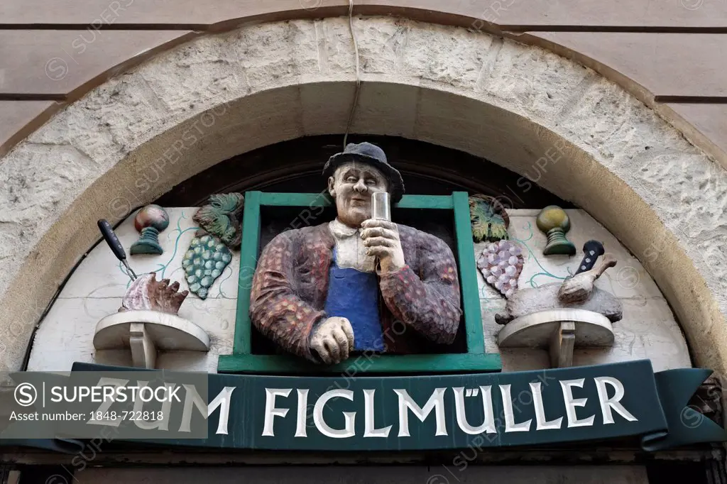 Zum Figlmueller tavern, portal with figure of a wine drinker, passage to the famous Schnitzelhaus building, Vienna, Austria, Europe