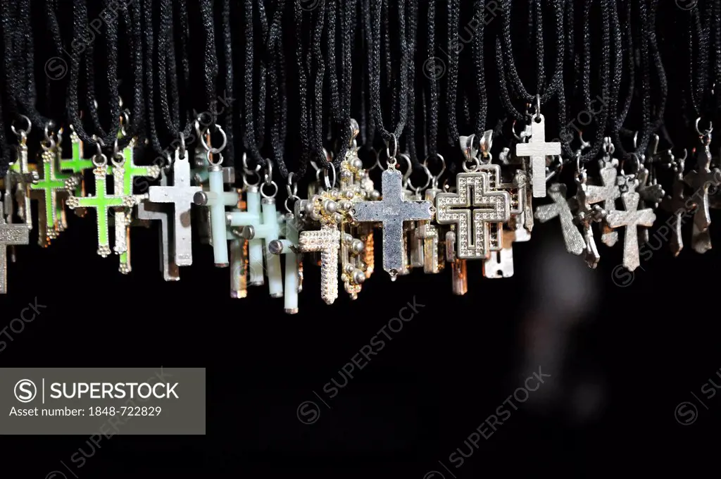 Crucifixes, pendants at a stall offering Christian products, Christian quarter of Youhanabad, Lahore, Punjab, Pakistan, Asia