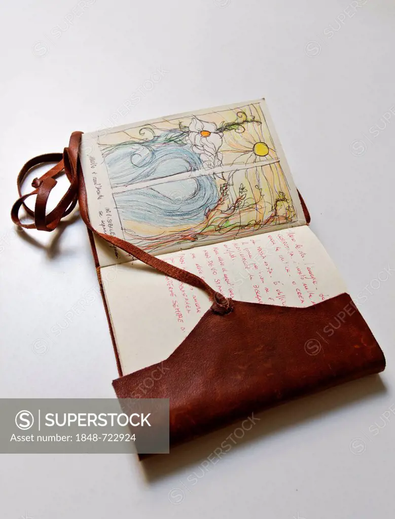 Handwritten and hand-painted old vintage leather sketch book, personal diary