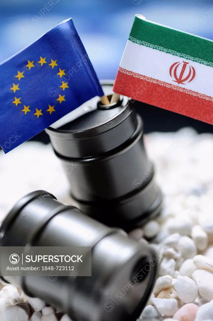 EU flag and flag of Iran in oil drums, symbolic image for an oil embargo by the EU against Iran