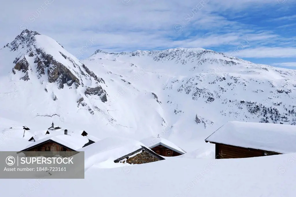 Snow-covered mountain village near the Sennhuette Schnydi in Leukerbad, Valais, Switzerland, Europe