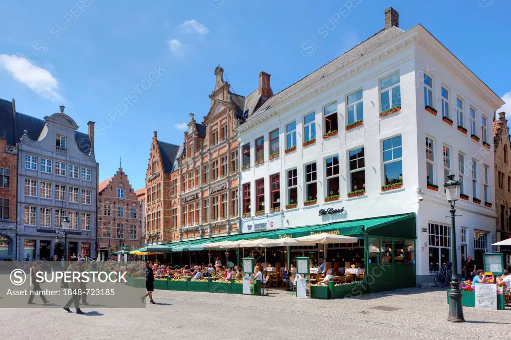 Guild houses and outdoor restaurants in Grote Markt square, historic centre of Bruges, UNESCO World Heritage Site, West Flanders, Flemish Region, Belg...