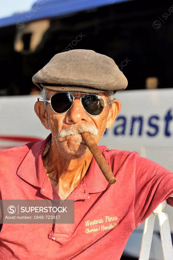 Cuban man smoking a cigar, Vinales, Valle de Vinales, Province of Pinar del Rio, Cuba, Greater Antilles, Caribbean, Central America, America