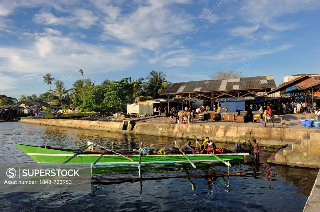 Outrigger at the fish market in Kota Biak, Biak Island, West Papua, Indonesia, Southeast Asia, Asia