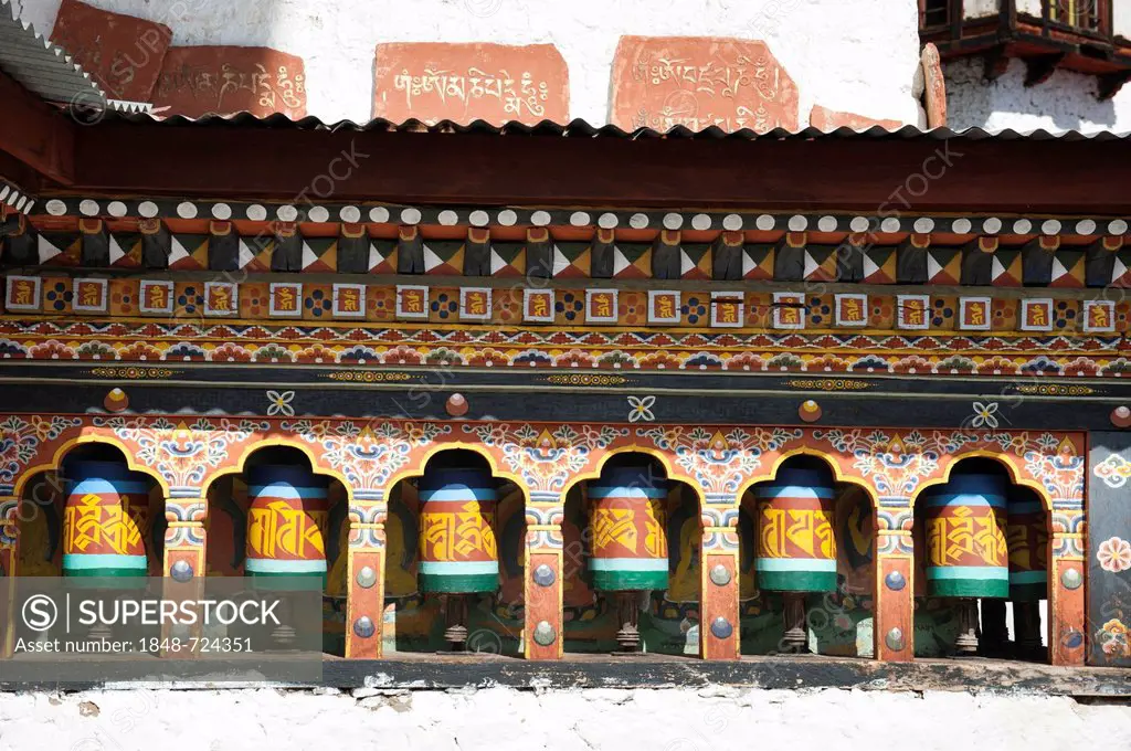 Colourful prayer wheels, Cheri Goemba Monastery, Chagri Dorjeden Monastery, near Thimphu, Kingdom of Bhutan, South Asia, Asia