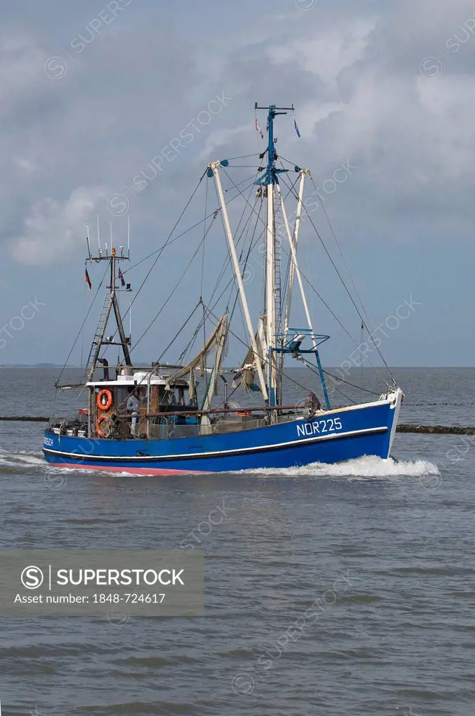 Shrimp boat Nordmeer, NOR 225, entering the harbour of Norddeich, Wadden Sea UNESCO World Heritage Site, East Frisia, Lower Saxony, North Sea, Germany...
