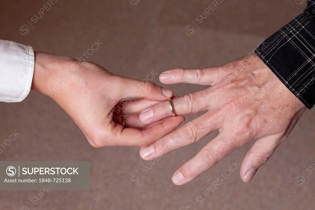 Old and young getting married, young woman, 27, and man, 59