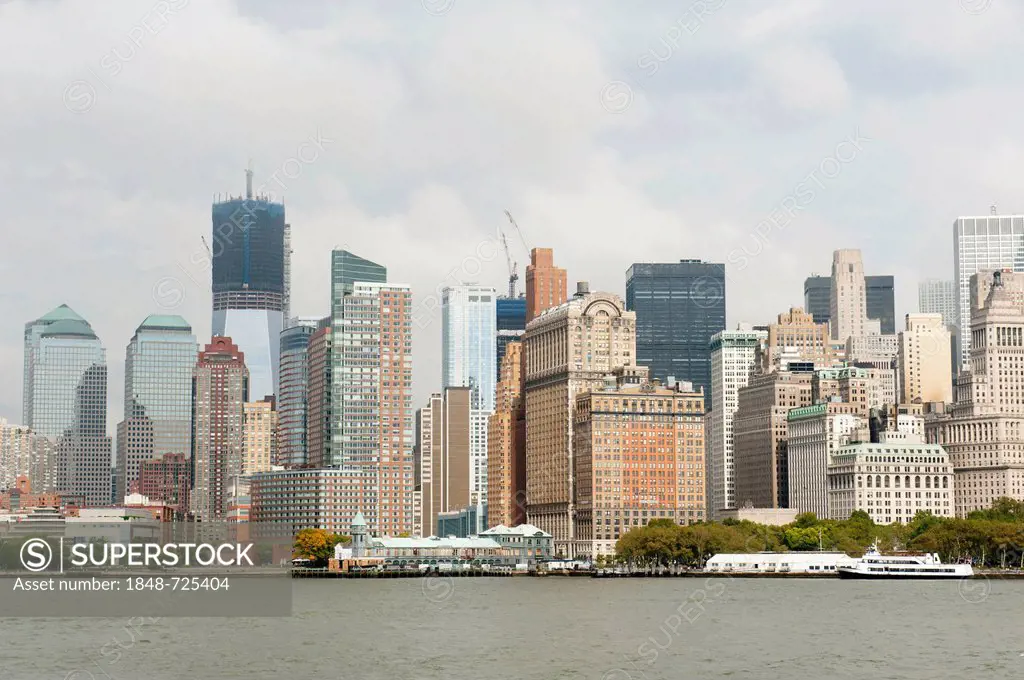 Metropolis, view of high-rise buildings and skyline, Financial District, Battery Park, One World Trade Center under construction, Freedom Tower, New Y...