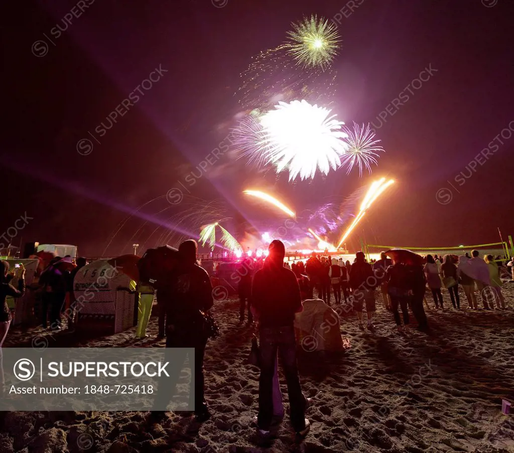 Baltic Sea in Flames, on Groemitz Pier, fireworks display at the end of the season, beach, spectators, at night, Baltic Sea resort town of Ostseebad G...