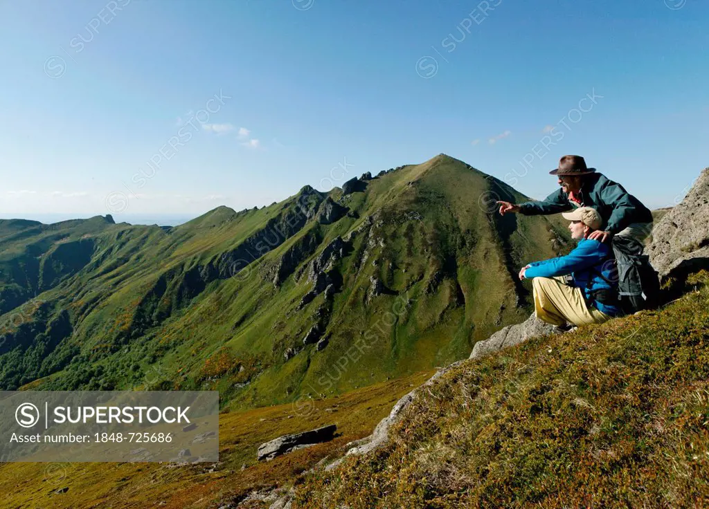 Hikers in the Massif du Sancy, Parc Naturel Regional des Volcans d'Auvergne, Regional Nature Park of the Volcanoes of Auvergne, Monts Dore, Puy de Dom...